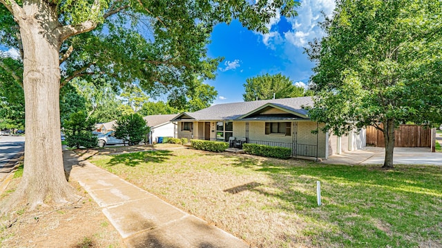 1031 Oak Hurst Dr, Grapevine, TX 76051 - ranch-style house featuring concrete driveway, a porch, brick siding, and an attached garage