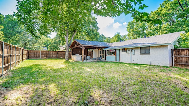 1031 Oak Hurst Dr, Grapevine, TX 76051 - back of house with a fenced backyard, a patio area, and brick siding