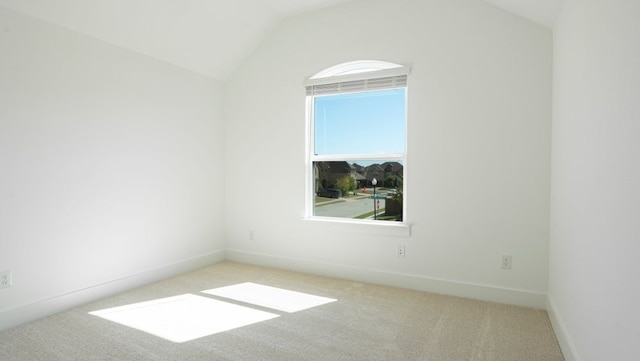 1032 Meadowlark, Forney, TX 75126 - carpeted empty room featuring vaulted ceiling and baseboards