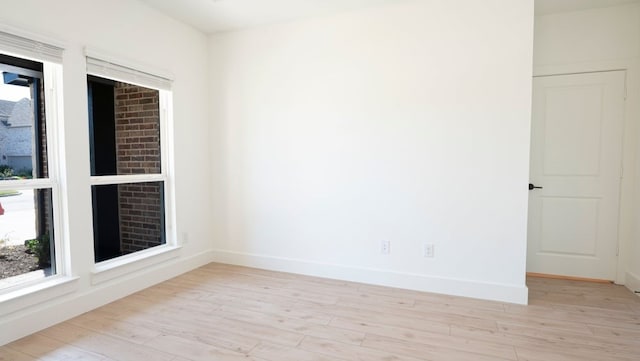 1032 Meadowlark, Forney, TX 75126 - empty room featuring light wood-style flooring and healthy amount of natural light