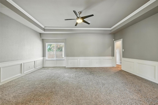 1208 Homestead St, Flower Mound, TX 75028 - spare room with a raised ceiling, ornamental molding, a ceiling fan, carpet, and a decorative wall