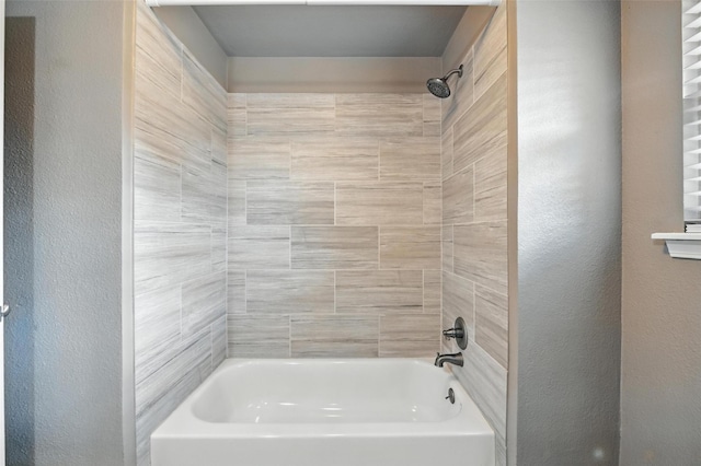 1208 Homestead St, Flower Mound, TX 75028 - bathroom featuring bathtub / shower combination and a textured wall