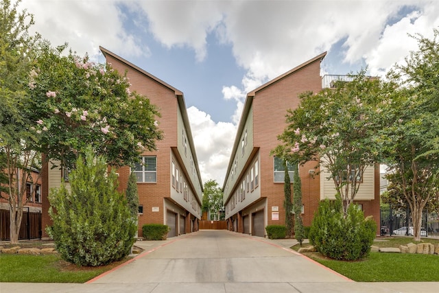 5875 Ross Ave Unit 1, Dallas, TX 75206 - view of property featuring driveway and an attached garage