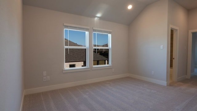 850 Blue Heron Dr, Forney, TX 75126 - carpeted empty room featuring lofted ceiling and recessed lighting