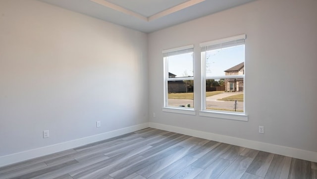 850 Blue Heron Dr, Forney, TX 75126 - spare room featuring baseboards and light wood finished floors