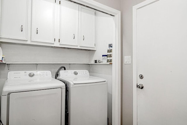 5714 Stage Line Dr, Arlington, TX 76017 - washroom with cabinet space and washer and dryer