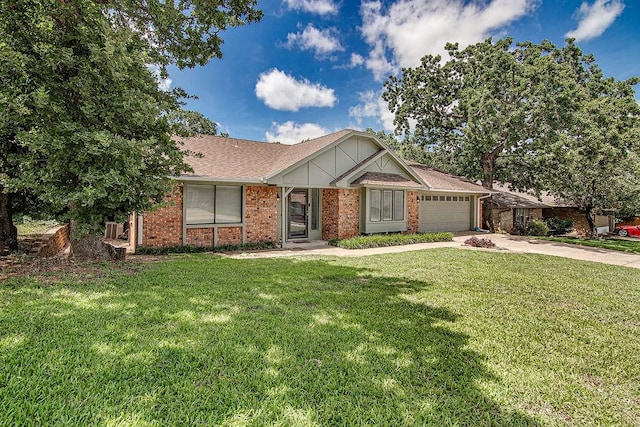 5714 Stage Line Dr, Arlington, TX 76017 - tudor home with driveway, a garage, a front yard, brick siding, and a shingled roof