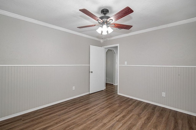 5714 Stage Line Dr, Arlington, TX 76017 - unfurnished room with wood finished floors, a ceiling fan, ornamental molding, and a wainscoted wall