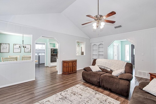 5714 Stage Line Dr, Arlington, TX 76017 - living room featuring arched walkways, washer / dryer, wood finished floors, a ceiling fan, and built in features
