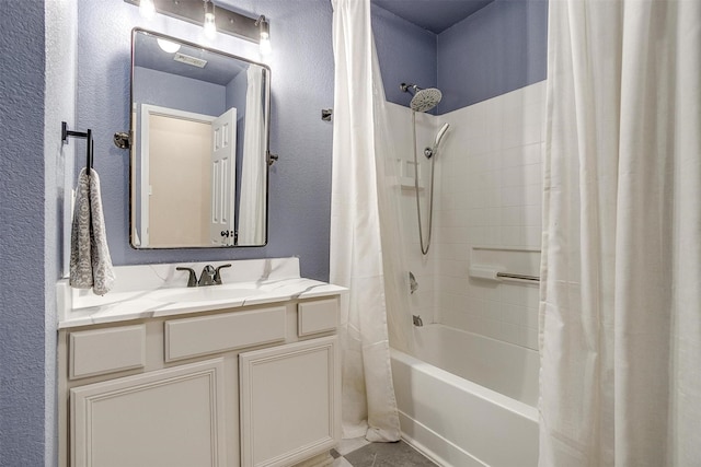 953 Mesa Vista Dr, Crowley, TX 76036 - bathroom with a textured wall, shower / bath combo with shower curtain, and vanity