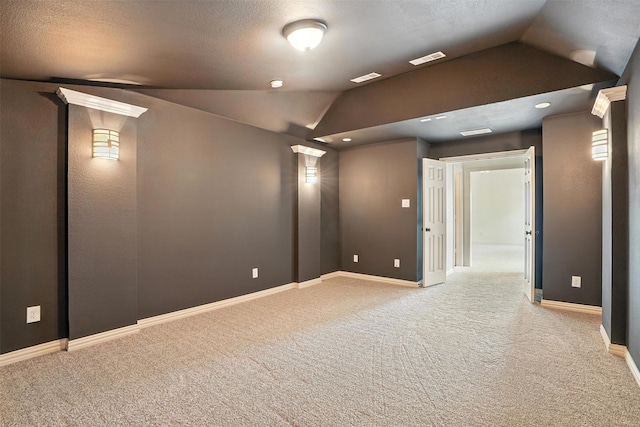 1312 Bluebell Ave, Lantana, TX 76226 - unfurnished room with lofted ceiling, light carpet, and a smoke detector