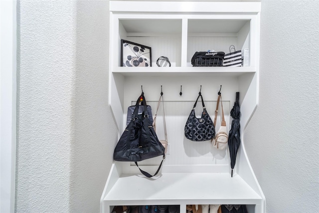 3604 Chapman Cir, Rowlett, TX 75089 - mudroom featuring a textured wall