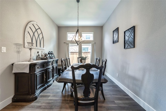 3604 Chapman Cir, Rowlett, TX 75089 - dining space with a chandelier, dark wood finished floors, and a textured wall