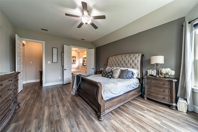 3604 Chapman Cir, Rowlett, TX 75089 - bedroom featuring wood finished floors, ceiling fan, and connected bathroom