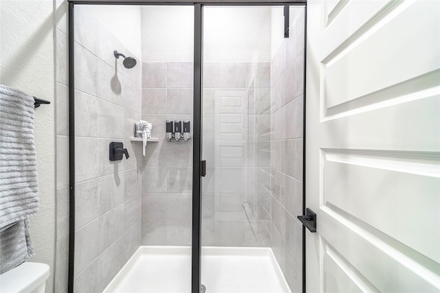 3604 Chapman Cir, Rowlett, TX 75089 - full bathroom with a shower stall and toilet