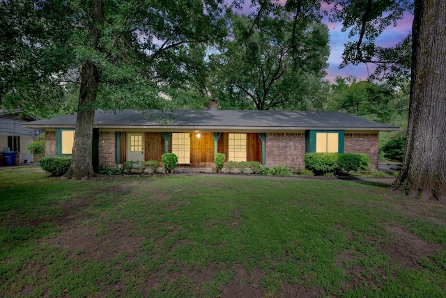 3053 Pines Rd, Shreveport, LA 71119 - single story home with brick siding, a front yard, and a chimney