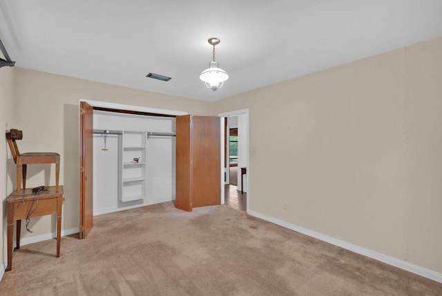 3053 Pines Rd, Shreveport, LA 71119 - unfurnished bedroom featuring light carpet and a closet