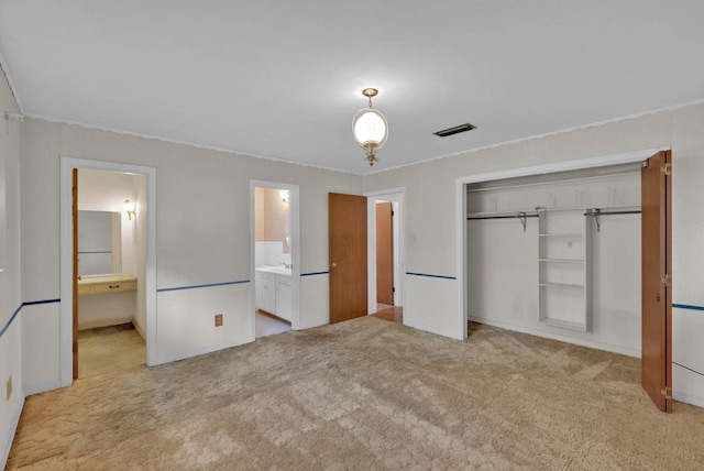 3053 Pines Rd, Shreveport, LA 71119 - unfurnished bedroom with carpet flooring, a closet, ornamental molding, and ensuite bath