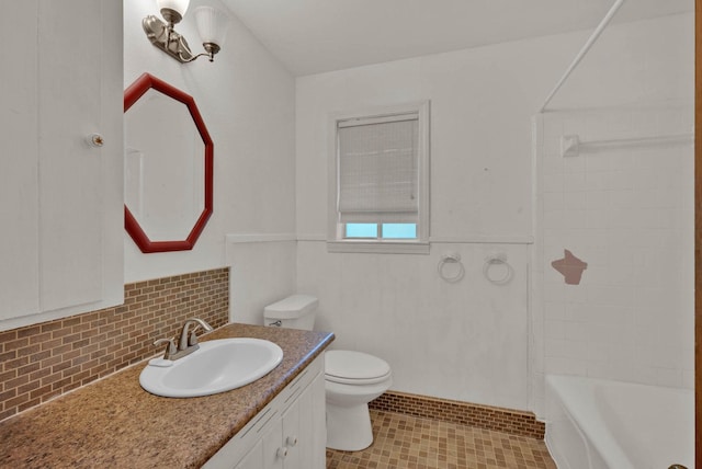 3053 Pines Rd, Shreveport, LA 71119 - bathroom with vanity, shower / bath combination, and wainscoting