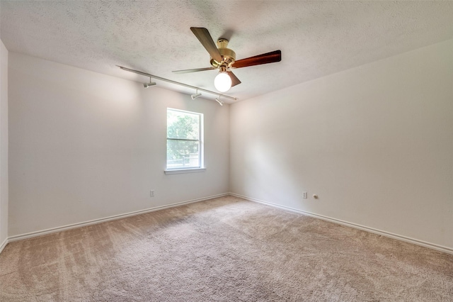 4645 Pecan Place Dr, Mckinney, TX 75071 - spare room with carpet flooring, ceiling fan, and a textured ceiling