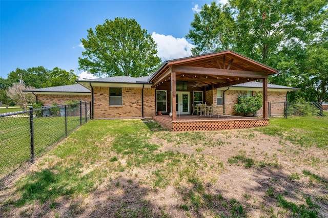 4645 Pecan Place Dr, Mckinney, TX 75071 - back of house featuring a fenced backyard, brick siding, french doors, and a deck