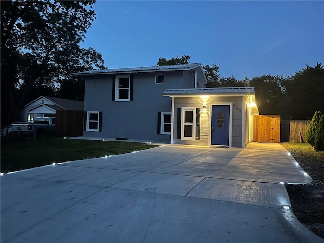 629 Kimbrough St, White Settlement, TX 76108 - view of front facade featuring a metal roof and stucco siding