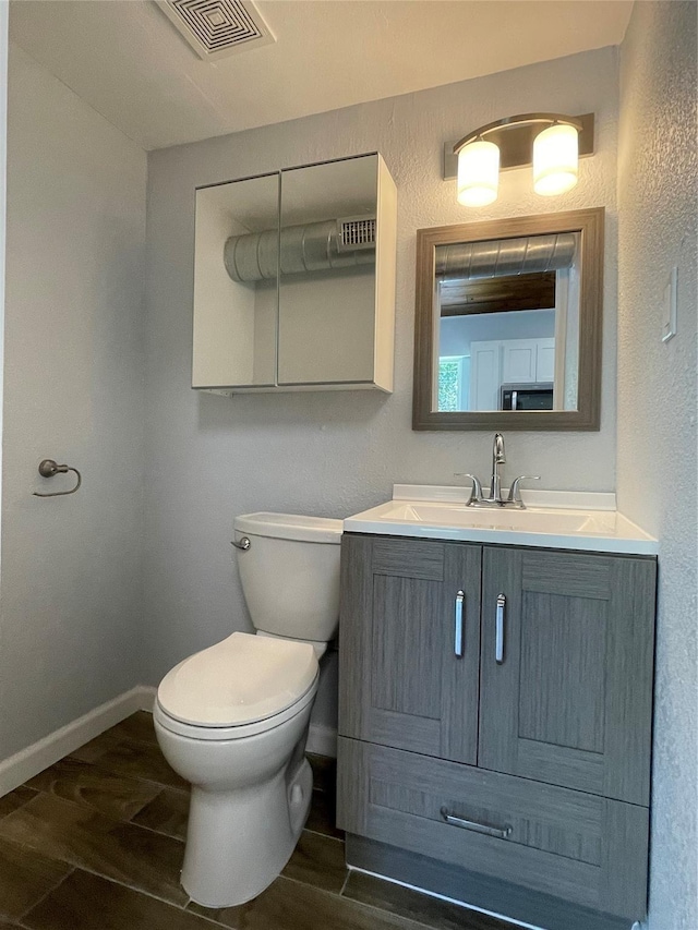 629 Kimbrough St, White Settlement, TX 76108 - half bathroom featuring wood finished floors and vanity