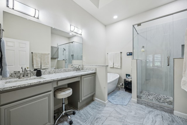 4003 Randall Ln, Carrollton, TX 75007 - full bathroom with a stall shower, double vanity, a freestanding tub, and recessed lighting
