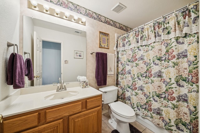 4003 Randall Ln, Carrollton, TX 75007 - full bath with vanity, tile patterned floors, and a shower with curtain