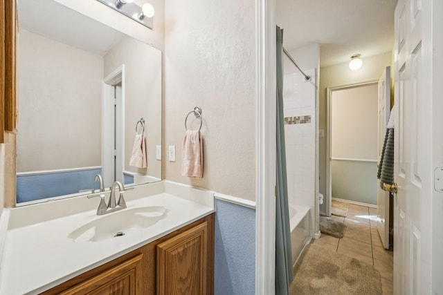 4003 Randall Ln, Carrollton, TX 75007 - bathroom with vanity, shower / bathtub combination with curtain, and tile patterned floors