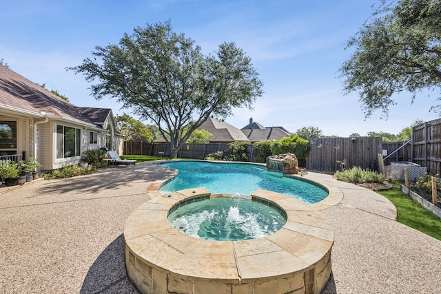 4003 Randall Ln, Carrollton, TX 75007 - view of pool featuring a fenced backyard, a pool with connected hot tub, and a patio area