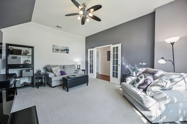 4003 Randall Ln, Carrollton, TX 75007 - living room featuring french doors, vaulted ceiling, a ceiling fan, and carpet floors