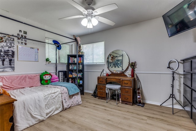 4105 Micki Lynn Ave, Fort Worth, TX 76107 - bedroom featuring wood finished floors, ceiling fan, and a wainscoted wall