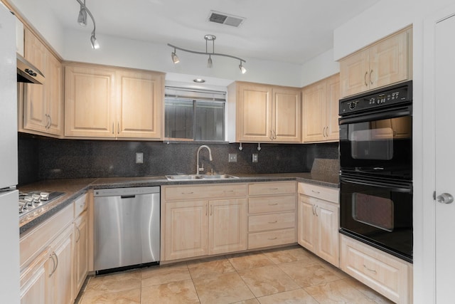 1705 Yorkshire Dr, Richardson, TX 75082 - kitchen with stainless steel appliances, light brown cabinets, backsplash, and dark countertops