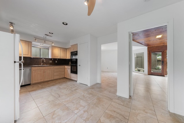 1705 Yorkshire Dr, Richardson, TX 75082 - kitchen with freestanding refrigerator, dishwasher, light brown cabinetry, backsplash, and rail lighting