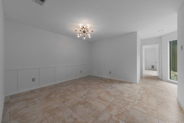 1705 Yorkshire Dr, Richardson, TX 75082 - spare room with a chandelier