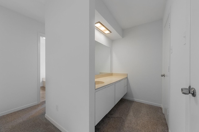 1705 Yorkshire Dr, Richardson, TX 75082 - bathroom with vanity and baseboards