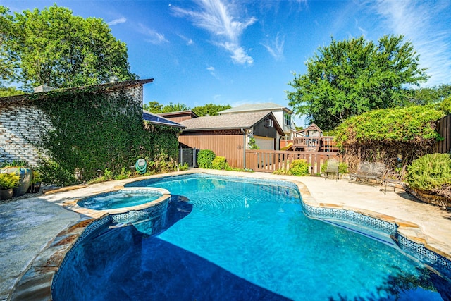 1705 Yorkshire Dr, Richardson, TX 75082 - view of pool with a fenced backyard, a pool with connected hot tub, a patio, and an outbuilding