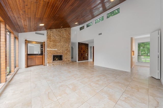 1705 Yorkshire Dr, Richardson, TX 75082 - unfurnished living room with wood ceiling, high vaulted ceiling, and a brick fireplace