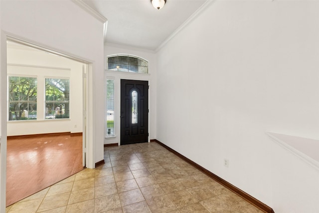 2930 Coteau Way, Dallas, TX 75227 - entryway with healthy amount of natural light, crown molding, and light tile patterned floors