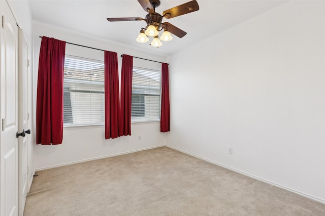 2930 Coteau Way, Dallas, TX 75227 - carpeted spare room featuring baseboards and a ceiling fan