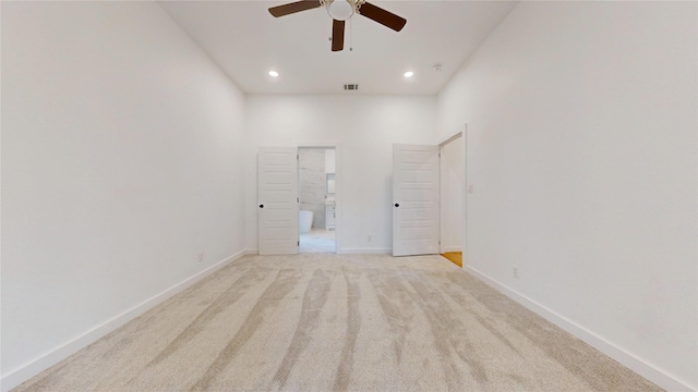 3418 Borger St, Dallas, TX 75212 - unfurnished bedroom featuring recessed lighting, light colored carpet, connected bathroom, and a ceiling fan