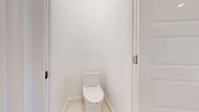 3418 Borger St, Dallas, TX 75212 - bathroom featuring toilet and baseboards