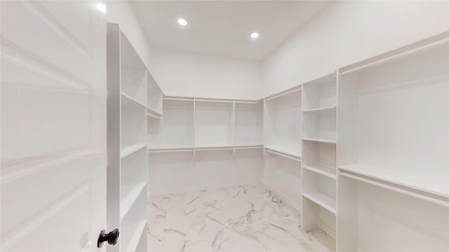 3418 Borger St, Dallas, TX 75212 - spacious closet featuring light marble finish flooring