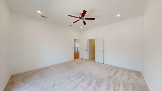 3418 Borger St, Dallas, TX 75212 - empty room featuring light carpet, a ceiling fan, and recessed lighting