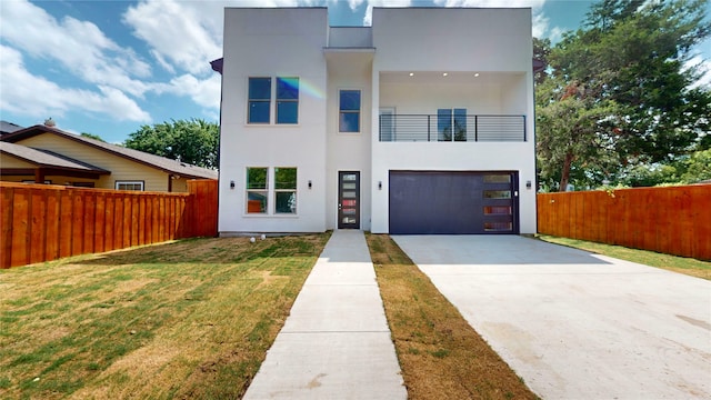 3418 Borger St, Dallas, TX 75212 - contemporary house featuring a balcony, stucco siding, driveway, and a garage