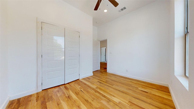 3418 Borger St, Dallas, TX 75212 - unfurnished bedroom featuring light wood-type flooring, a ceiling fan, and recessed lighting