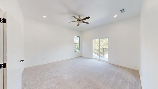 3418 Borger St, Dallas, TX 75212 - empty room featuring light colored carpet, a ceiling fan, and recessed lighting