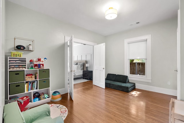 5610 Vanderbilt Ave, Dallas, TX 75206 - sitting room featuring wood finished floors