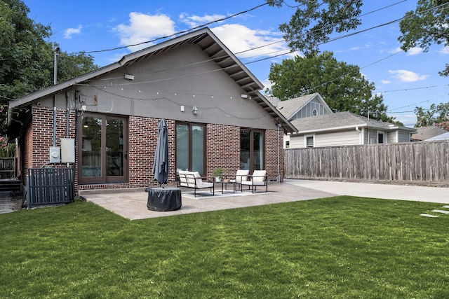 5610 Vanderbilt Ave, Dallas, TX 75206 - back of house with brick siding and a patio